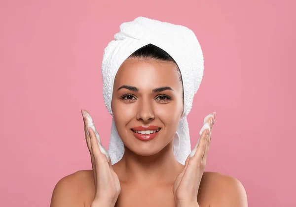 Beautiful Woman Applying Facial Cleansing Foam Pink Background —  Fotos de Stock