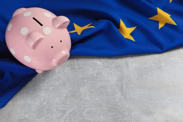 Pink Piggy Bank Flag European Union Light Grey Table Space — Stockfoto
