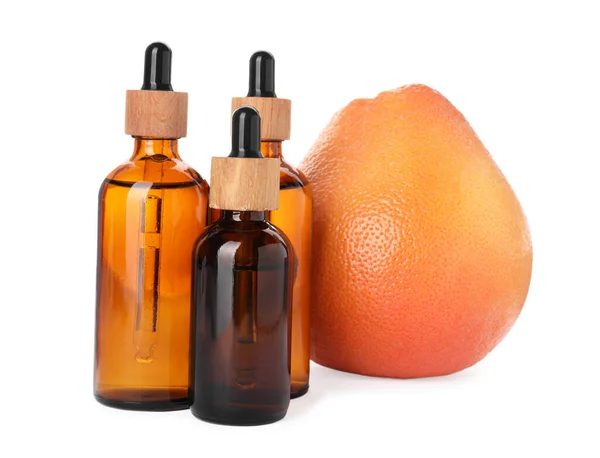 Bottles Citrus Essential Oil Fresh Grapefruit Isolated White — Stockfoto