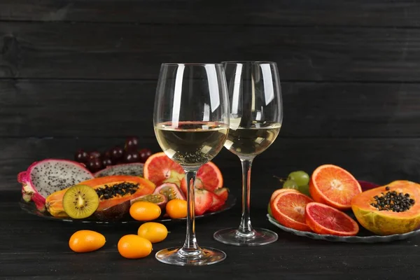 Delicious Exotic Fruits Wine Black Wooden Table — 스톡 사진