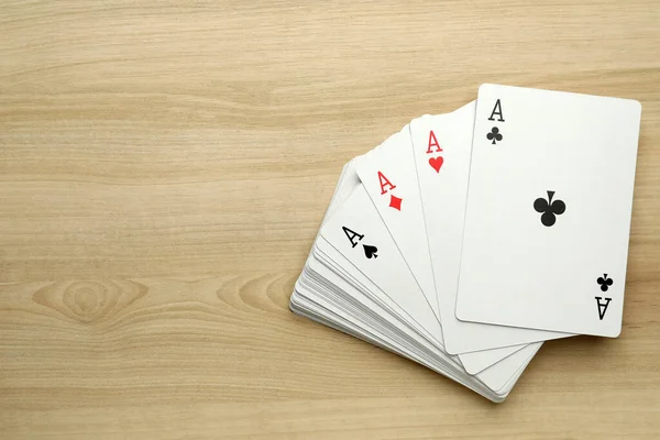 Four Aces Playing Cards Wooden Table Flat Lay Space Text — 图库照片