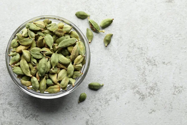 Glass Bowl Dry Cardamom Pods Light Grey Table Top View — 스톡 사진