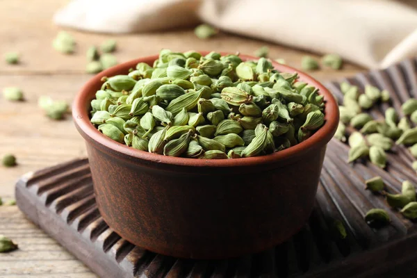 Bowl Dry Cardamom Pods Wooden Table Closeup — Stockfoto