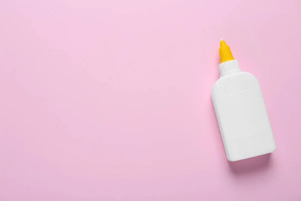 Bottle Glue Pink Background Top View Space Text — Stockfoto