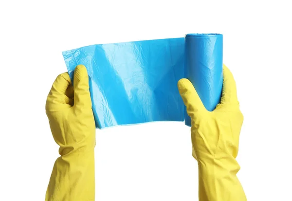 Person Rubber Gloves Holding Roll Turquoise Garbage Bags White Background — Fotografia de Stock