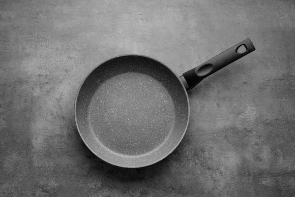 New Non Stick Frying Pan Grey Table Top View — Stockfoto