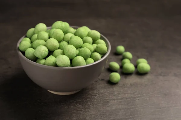 Tasty Wasabi Coated Peanuts Grey Table Closeup Space Text — 图库照片