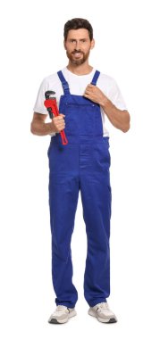 Professional plumber with pipe wrench on white background