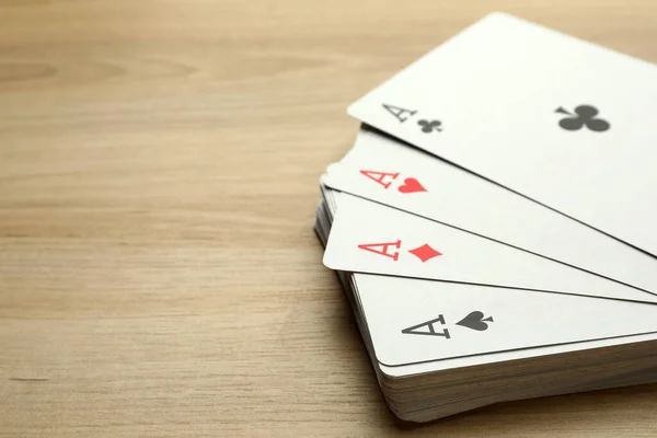 Four Aces Playing Cards Wooden Table Closeup Space Text — Foto de Stock