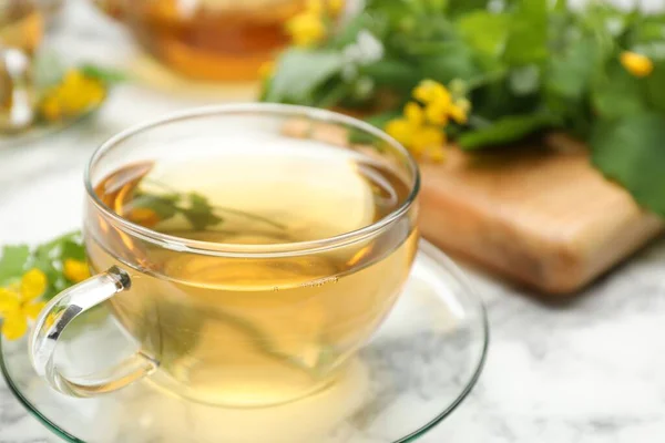 Glass Cup Aromatic Celandine Tea Flowers White Table Closeup — Stock Fotó