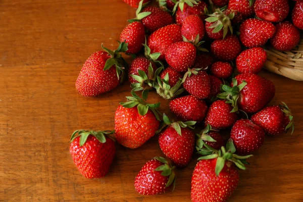 Basket Scattered Ripe Strawberries Wooden Table Top View — Stockfoto