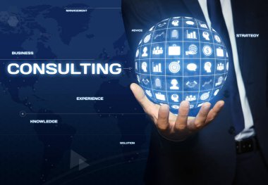Consulting concept. Man holding virtual globe with different icons, closeup