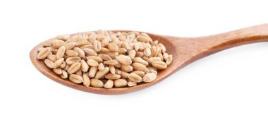 Tahta kaşık ve beyaz buğday taneleri.