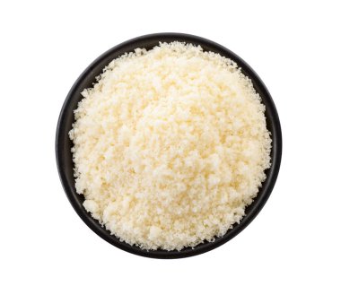 Bowl with grated parmesan cheese isolated on white, top view