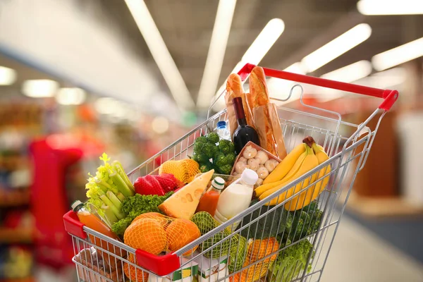 Shopping Cart Different Groceries Supermarket — Stockfoto