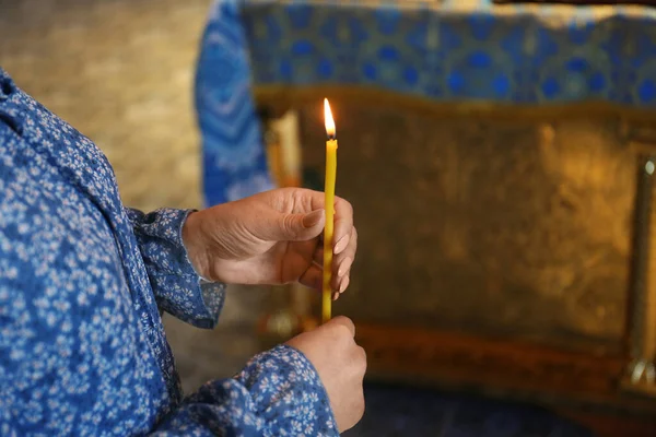 Mature Woman Holding Candle Church Closeup — 스톡 사진