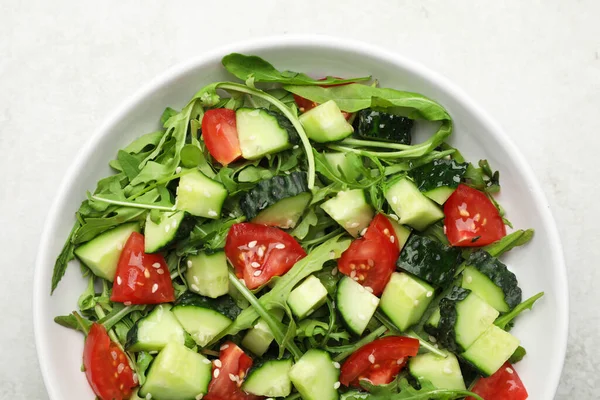 Delicious Salad Cucumbers Tomatoes Sesame Bowl Light Table Top View — Zdjęcie stockowe