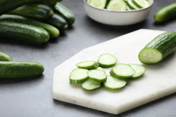 Whole Cut Fresh Ripe Cucumbers Grey Table — Stockfoto