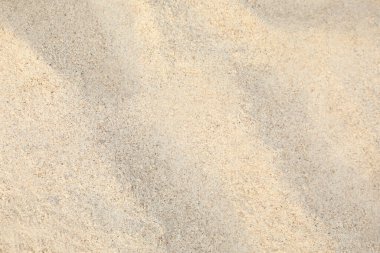 Arka plan olarak en üstteki kumsal manzarası