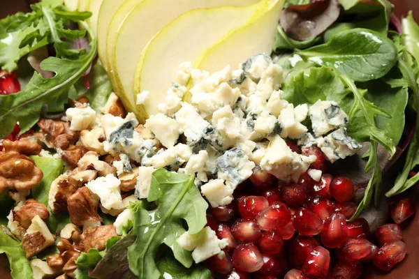 Tasty Salad Pear Slices Blue Cheese Walnuts Pomegranate Seeds Background — Stockfoto