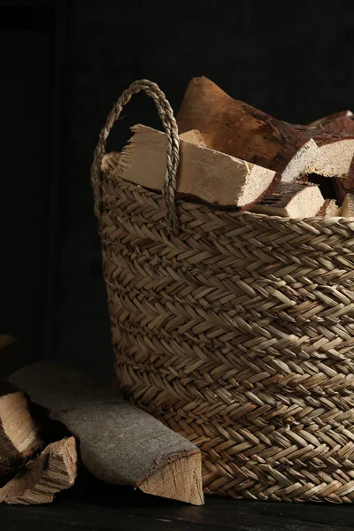 Wicker Basket Cut Firewood Table Dark Background Closeup — Fotografia de Stock