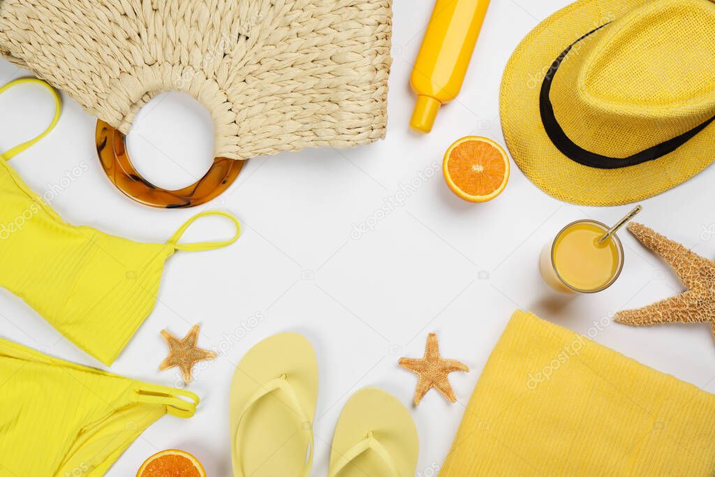 Frame of beach objects on white background, flat lay. Space for text