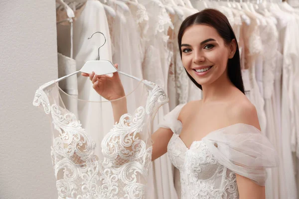 Young Woman Choosing Wedding Dress Salon Royalty Free Stock Images
