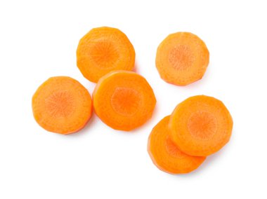 Slices of fresh ripe carrot on white background, top view