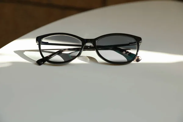 Stylish Black Eye Glasses White Table Space Text — Fotografia de Stock