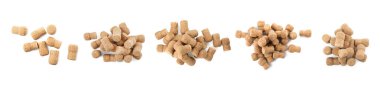 Set with corks of sparkling wine bottles on white background, top view. Banner design