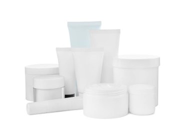 Set of different creams on white background