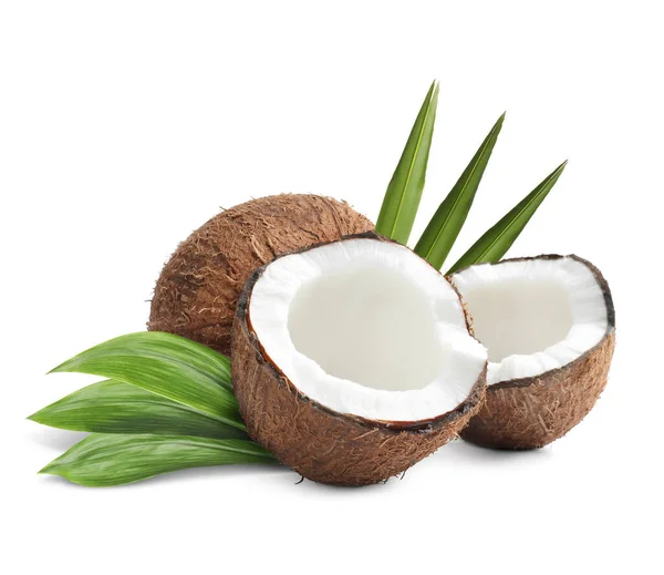 Tasty Ripe Coconuts Green Leaves White Background — Stock fotografie