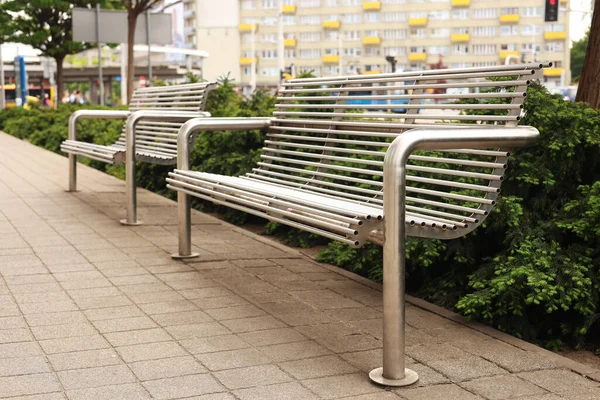 Stylish Metal Benches Coniferous Plants City Street — Stock Fotó