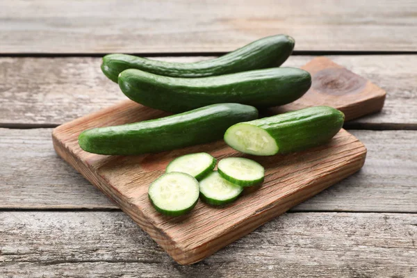 Whole Cut Fresh Ripe Cucumbers Wooden Table — Stock Photo, Image