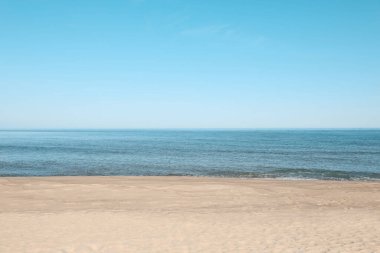 Picturesque view of sandy beach near sea