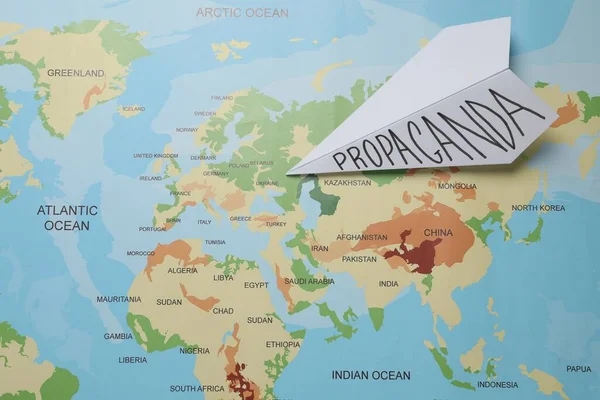 Paper Airplane Word Propaganda World Map Top View Information Warfare — Stockfoto