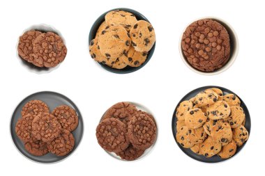 Set with delicious chocolate chip cookies on white background, top view