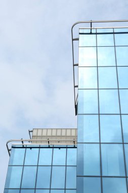 Modern building against blue sky. Urban architecture