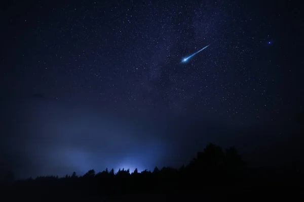 Beautiful view of shooting star in night sky