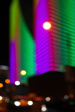 Blurred view of cityscape with bokeh effect. Night life