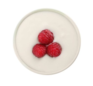 Delicious yogurt with raspberries in bowl isolated on white, top view