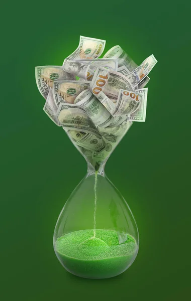 Time is money. Hourglass full of dollar banknotes converting into sand on green background