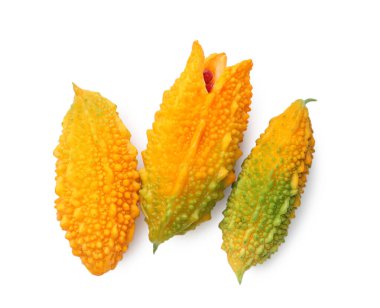 Fresh ripe bitter melons on white background, top view