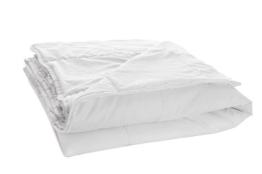 Beyaz üzerine katlanmış temiz battaniye. Ev yapımı tekstil