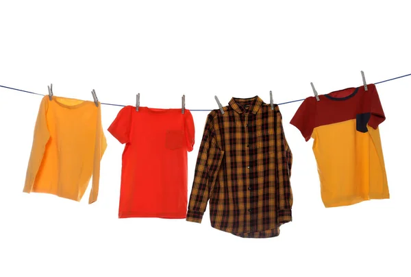 Different Bright Clothes Drying Washing Line White Background — 图库照片