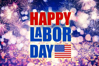 Happy Labor Day. Festive background with fireworks and glitters, bokeh effect