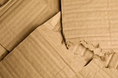 Arkaplan olarak parçalanmış karton parçaları, üst görünüm