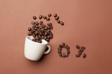 0 percent made of coffee beans and cup on color background, flat lay. Decaffeinated drink