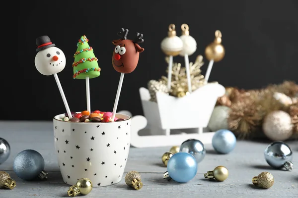 Delicious Christmas Themed Cake Pops Festive Decor Wooden Table Black — Stock Photo, Image