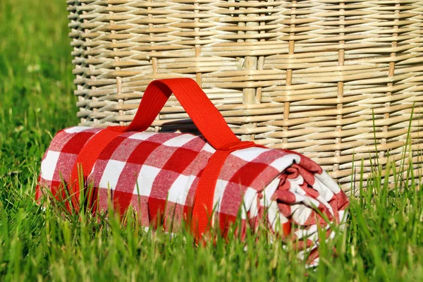 Rolled Checkered Tablecloth Picnic Basket Green Grass Closeup — Photo